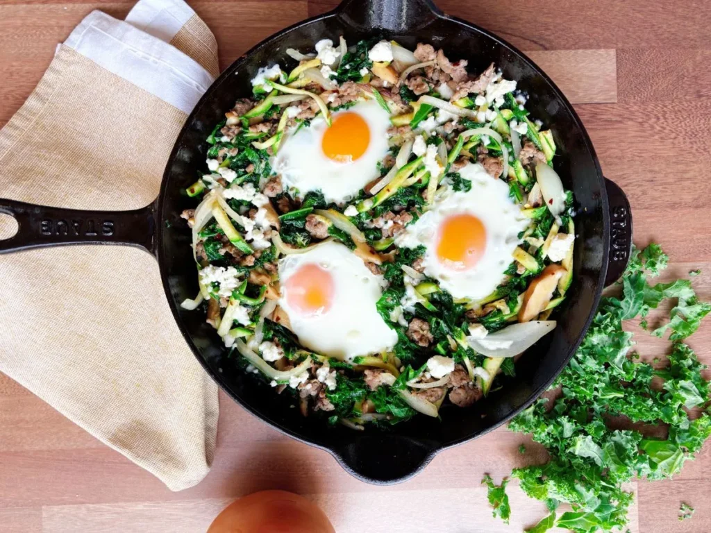 Eggs kale and rice in cast iron pan