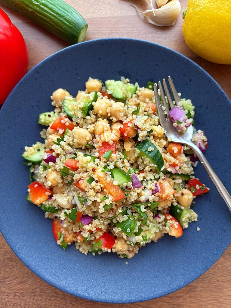 quinoa chickpea salad with cucumber, red peppers, parsley and lemon olive oil dressing